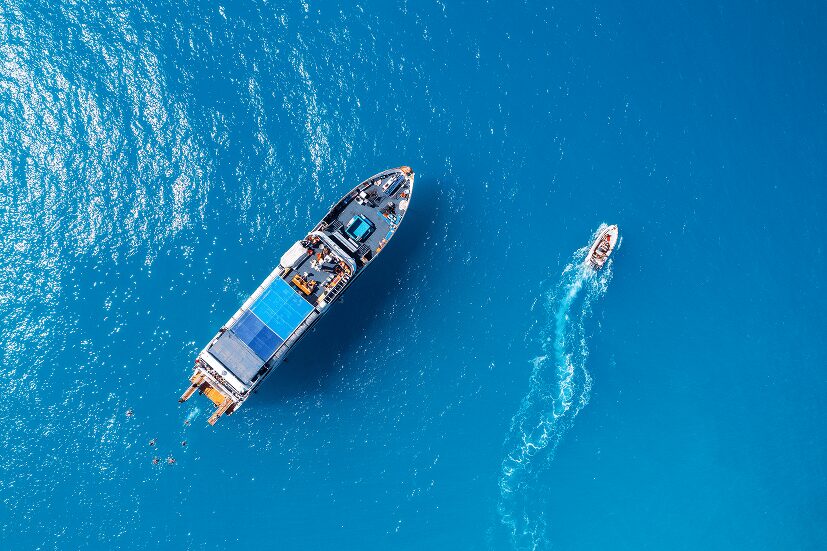 boat accompanied by smaller boat