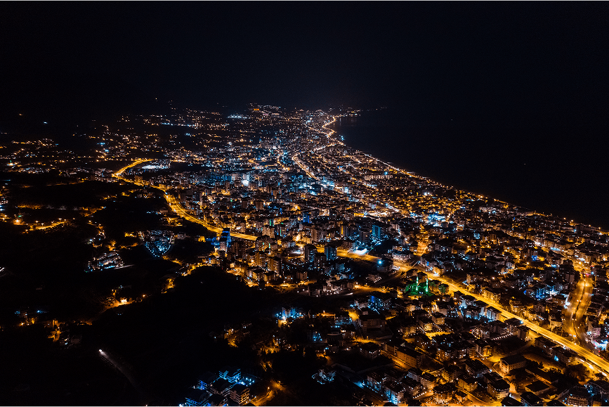 nighttime coastline city