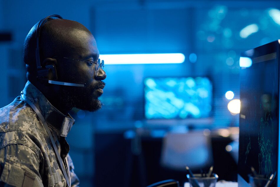 black man sitting at computer